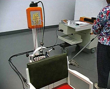 BIOS: the chair and the EEG device (in background)